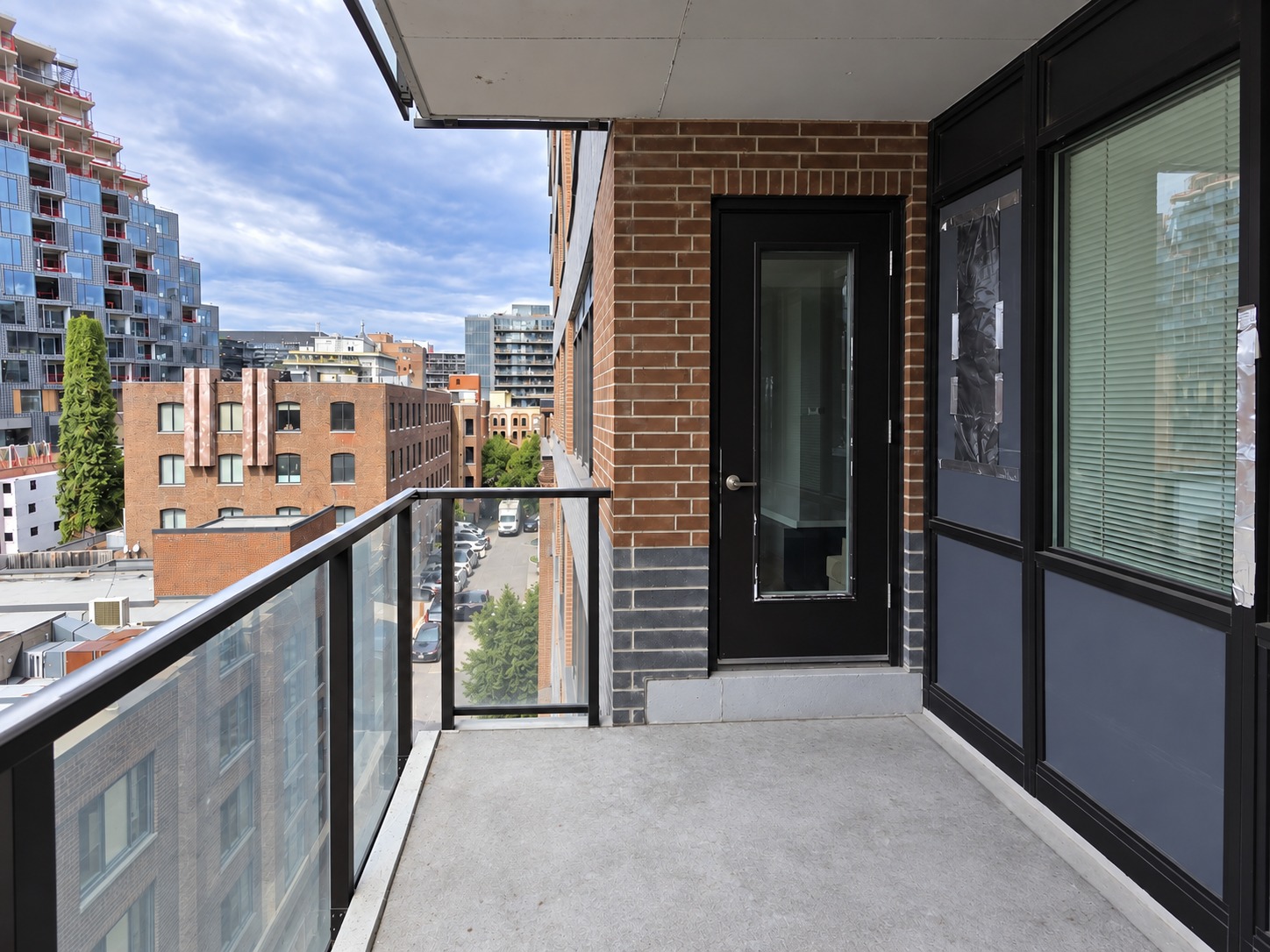 West-facing balcony with furniture and floor mat digitally removed using AI